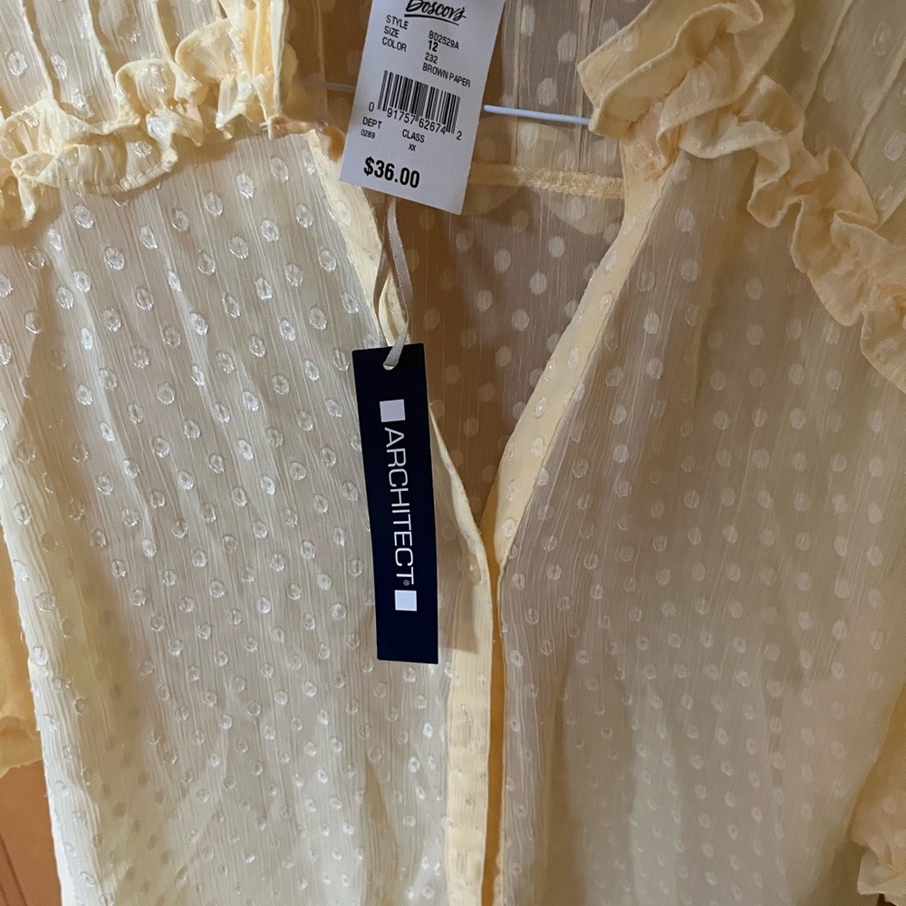 Yellow short sleeve blouse. New with tags